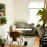Casa ecológica: Pequenas Mudanças no Dia a Dia para um Lar mais Ecológico gray fabric loveseat near brown wooden table