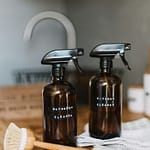 Dicas Eficazes Para Limpeza Natural da Sua Casa two brown spray bottles on brown table
