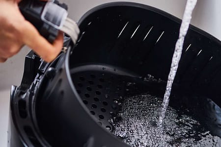 como limpar air fryer mondial por dentro